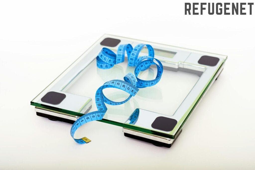 Blue Tape Measuring on Clear Glass Square Weighing Scale